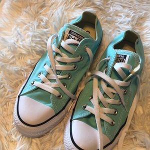 Turquoise converse tennis shoes
